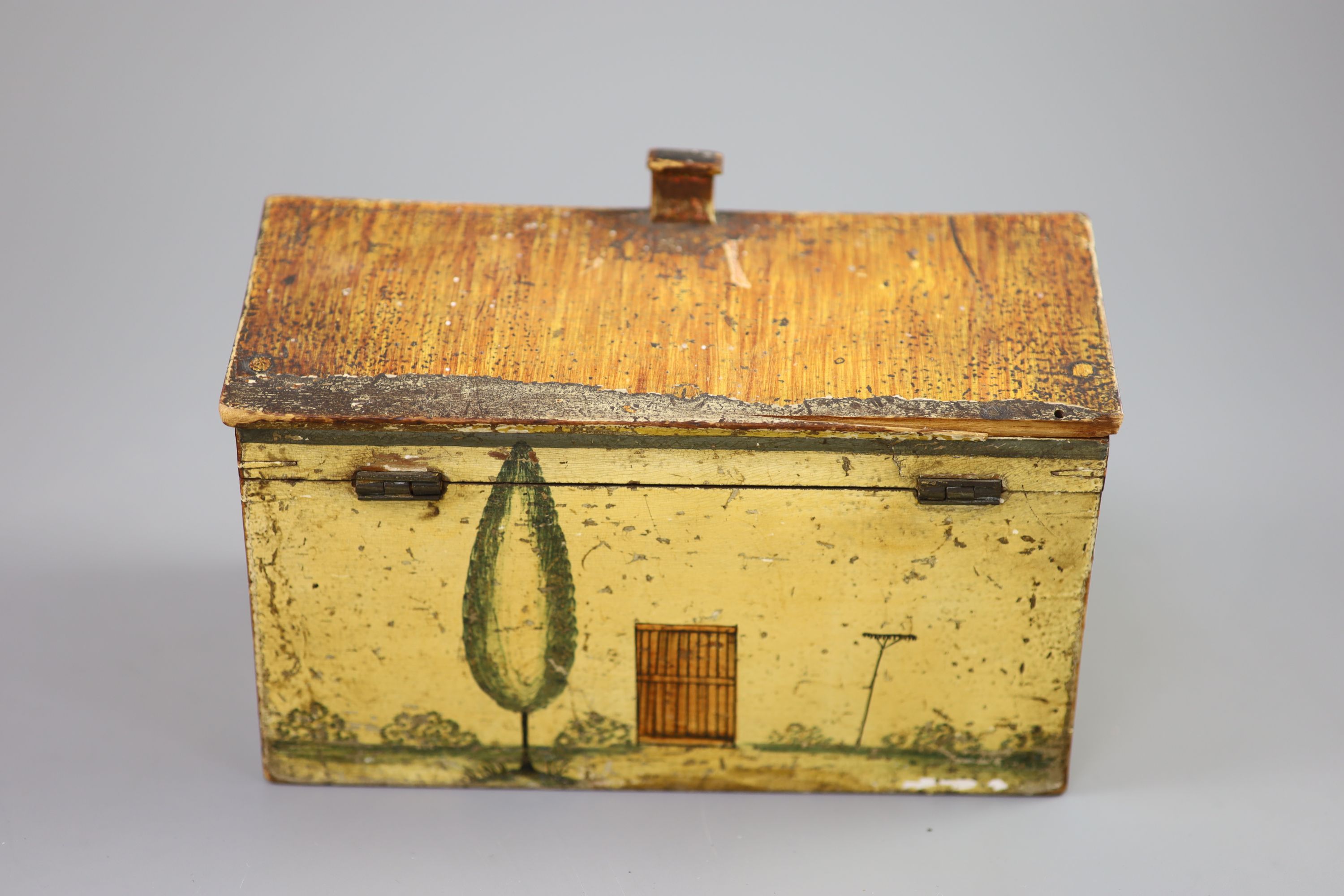 A Regency painted and penwork work box, modelled as a cottage, width 7.25in. depth 4.5in. height 5in.